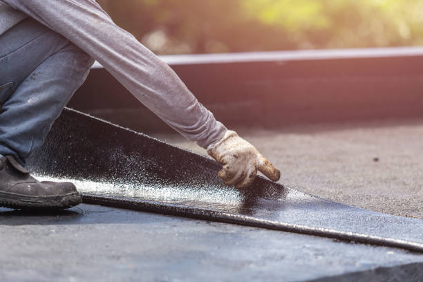 Professional Waterproofing technician working in West Islip, NY
